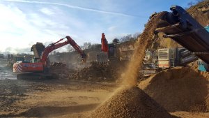 Conveyors and excavators at work