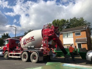 One of our AMIX mixers doing some community work and providing concrete.